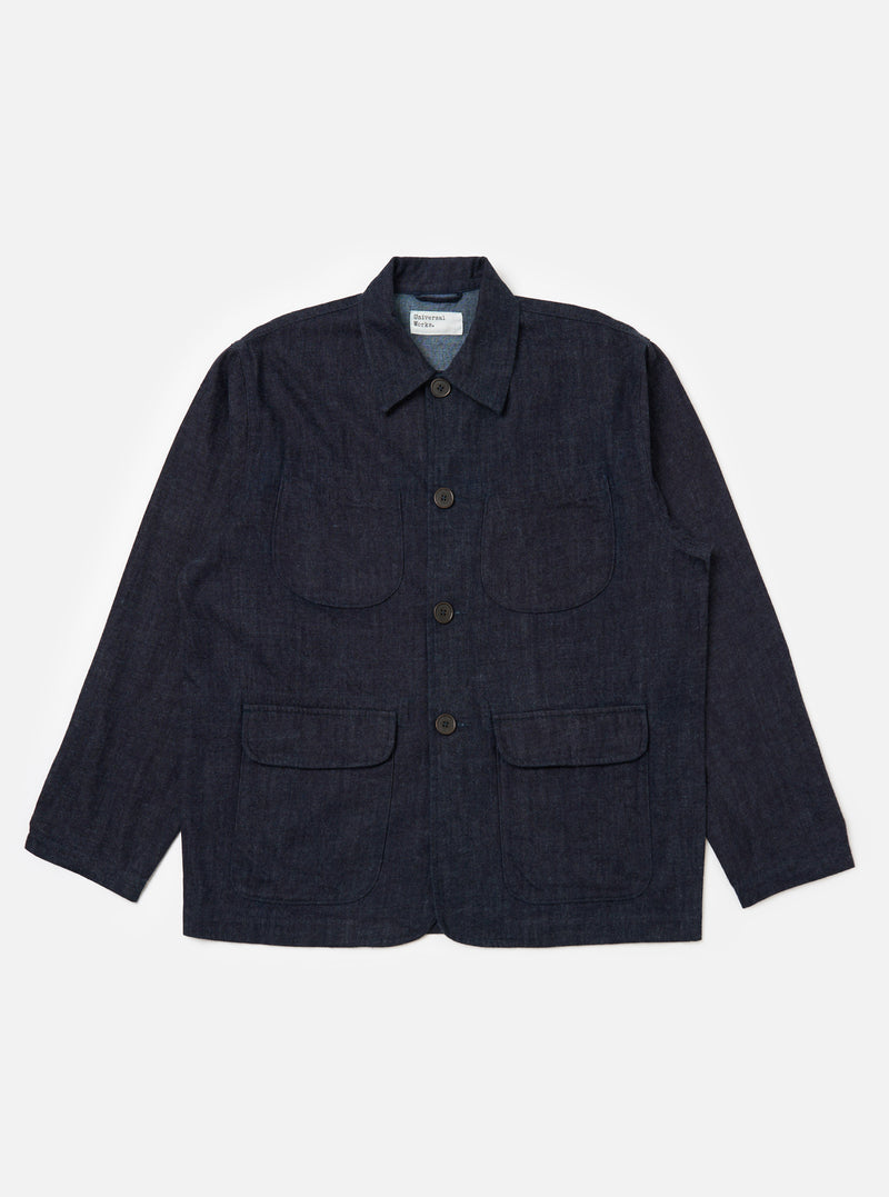 Indigo Brushed Denim Labour Jacket on a white background. The jacket is indigo with button closure and four pockets.