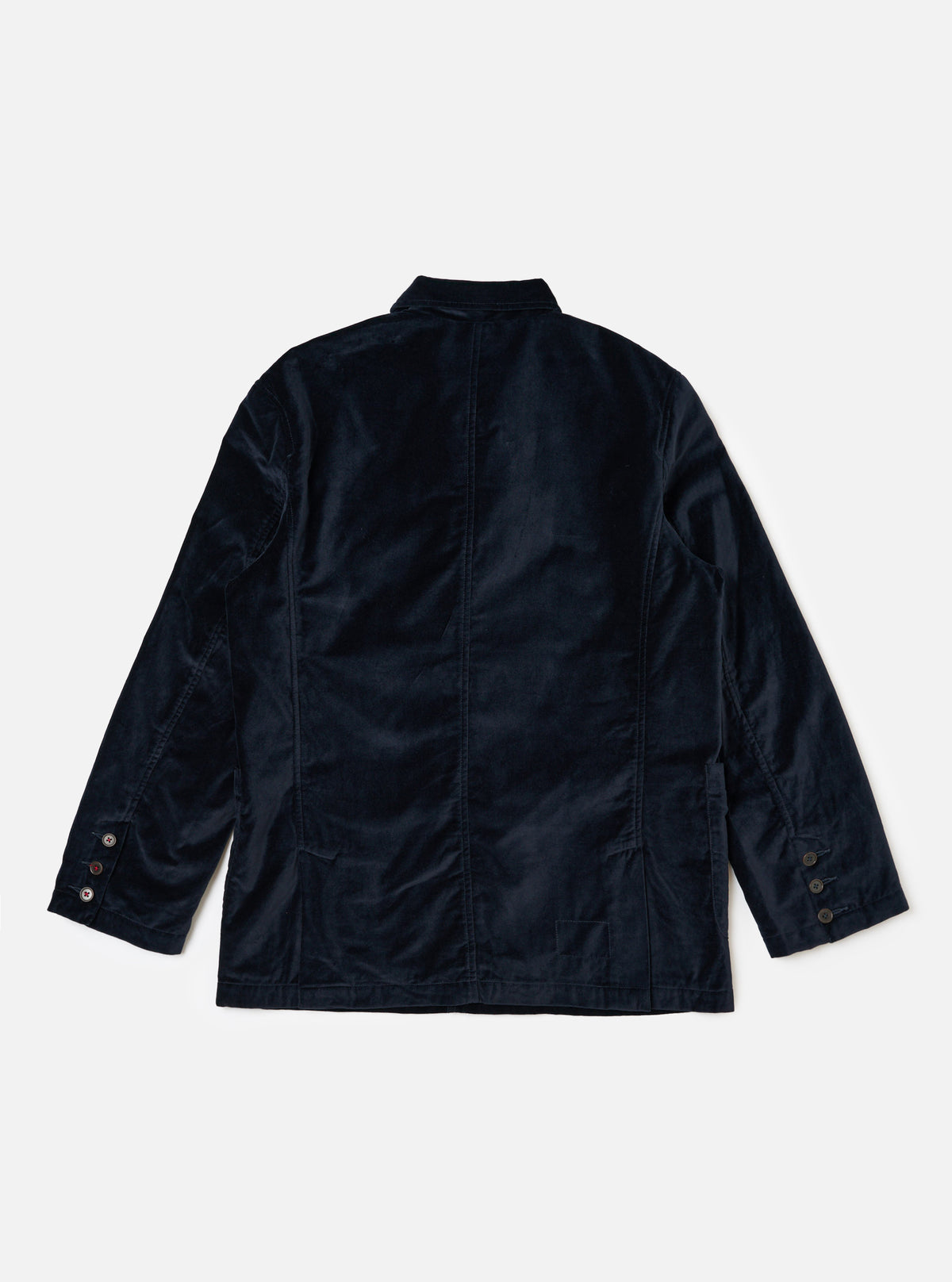 Back view of the Navy Velveteen Manor Jacket on a white background. The jacket is a rich navy color and has a classic, tailored fit with buttons on the sleeves.