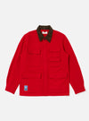 The Red Mowbray Military Fatigue Jacket in red wool with a brown corduroy collar, laid flat on a white background. Features multiple pockets and a small logo.