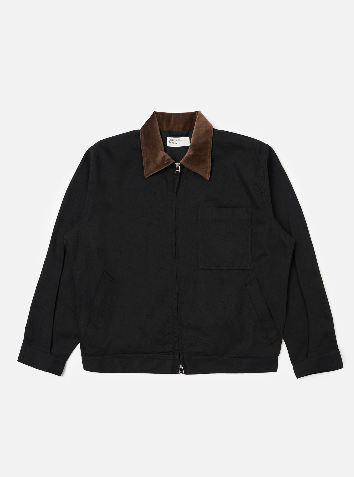 The Black Works Twill Rose Bowl Jacket on a clean white background. The jacket is black twill with a brown corduroy collar. It features a zip front and a chest pocket.