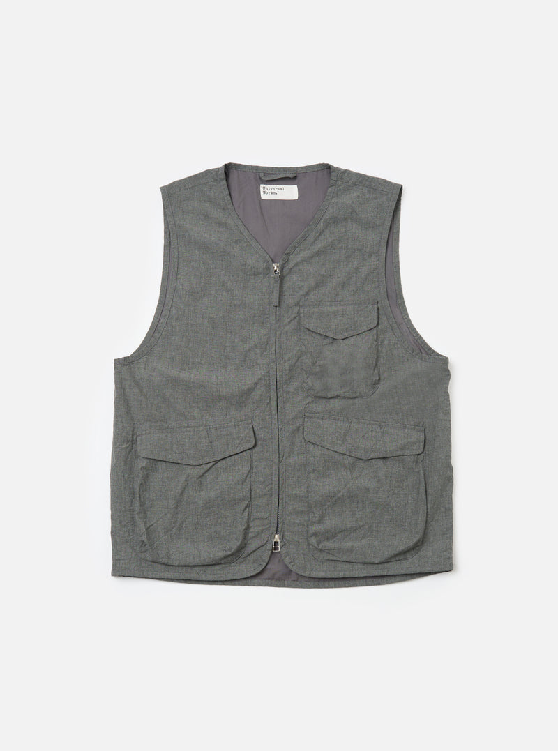 The Charcoal Organic Chambray Parachute Liner Gilet is displayed on a white background. The vest is charcoal gray and features a full zip front and four front pockets.