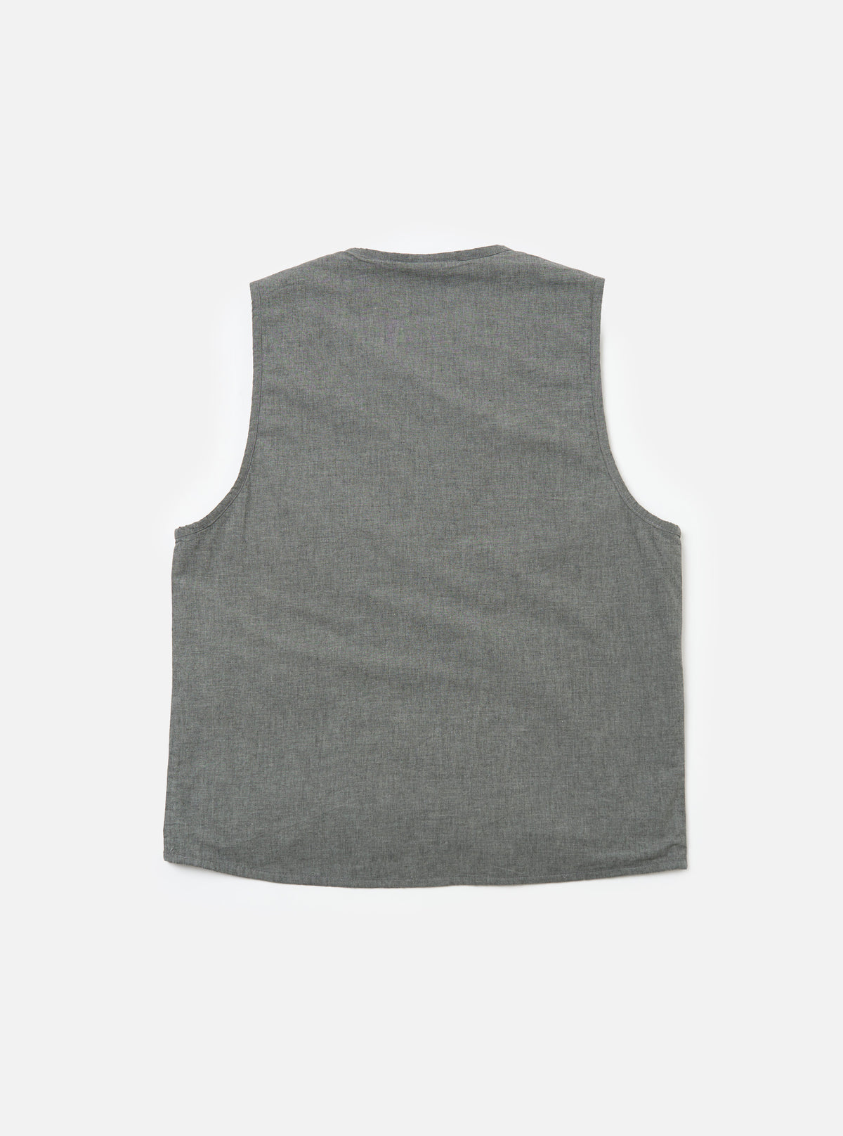 The back of a Charcoal Organic Chambray Parachute Liner Gilet, laid flat on a white surface. The gilet is a muted charcoal color with a subtle chambray texture.