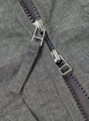 Close-up of the Charcoal Organic Chambray Parachute Liner Gilet, showcasing the organic chambray material and zipper detailing. The image highlights the texture and construction.