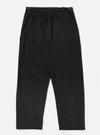 Back view of Black Organic Canvas Dutch Pant on a white background. The pants are wide-legged with belt loops and back pockets.