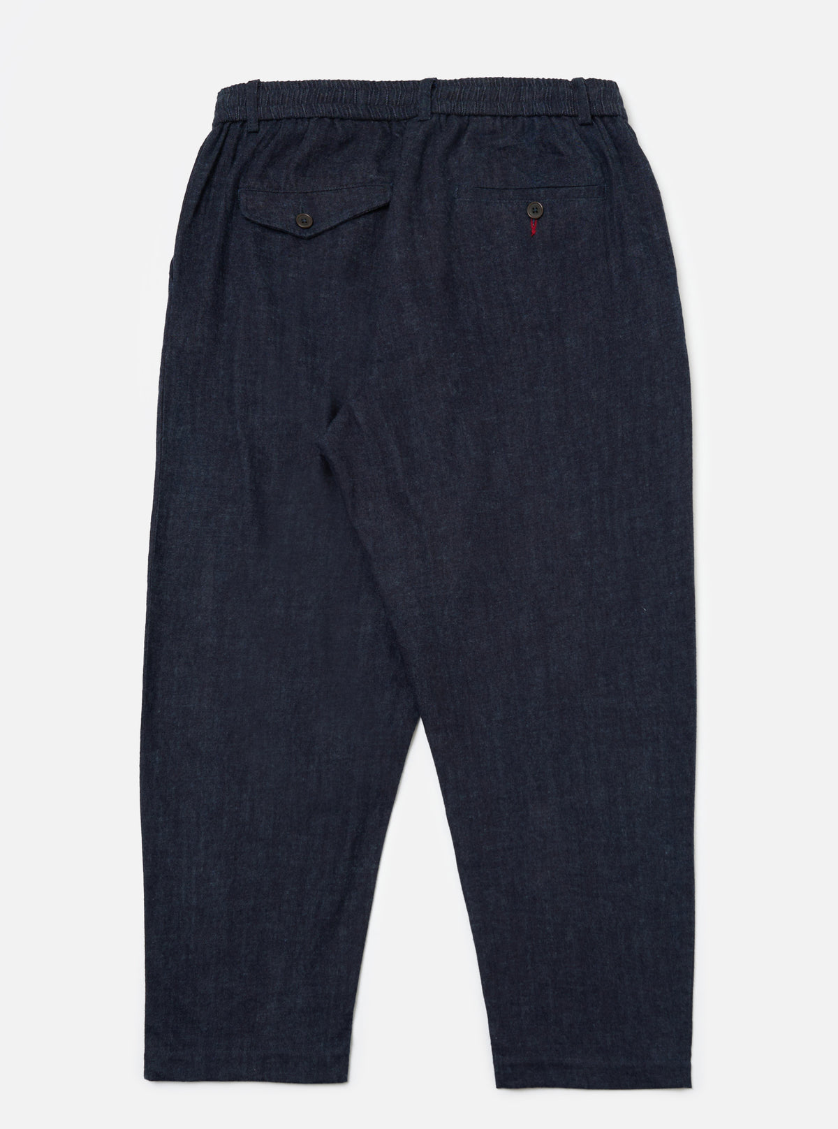 Back view of Indigo Brushed Denim Oxford Pant on a white background. The pants are a relaxed fit with an elastic waistband and buttoned pockets.