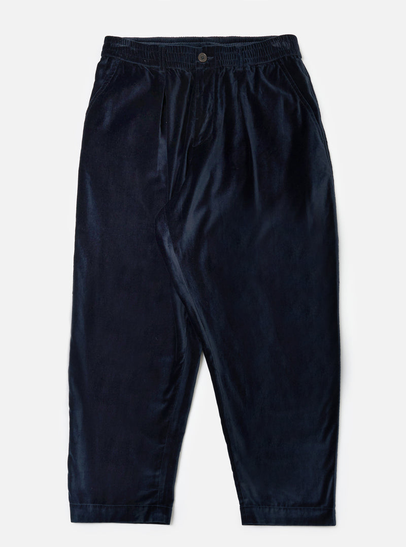 Close-up of the Navy Velveteen Oxford Pant on a white background. The pants are a rich navy color and have a relaxed fit.