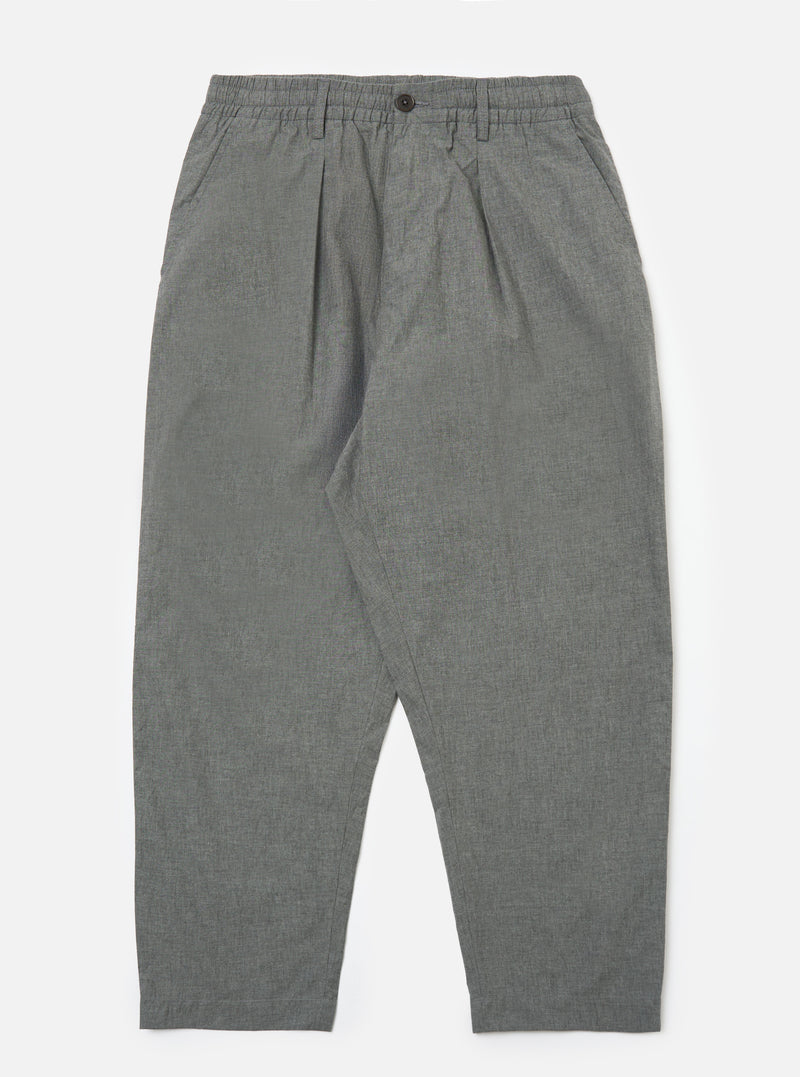 The Charcoal Organic Chambray Oxford Pant laid on a white background. These stylish pants are a versatile addition to any wardrobe.