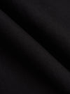 Close-up of the textured black organic canvas fabric of the Dockside Overshirt, showing the material's weave and color.