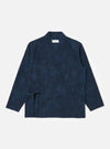 The Black/Indigo Denim Camo Kyoto Work Jacket is displayed on a white background. The jacket is a dark indigo color with a subtle camo pattern. It has a relaxed fit and a workwear-inspired design.