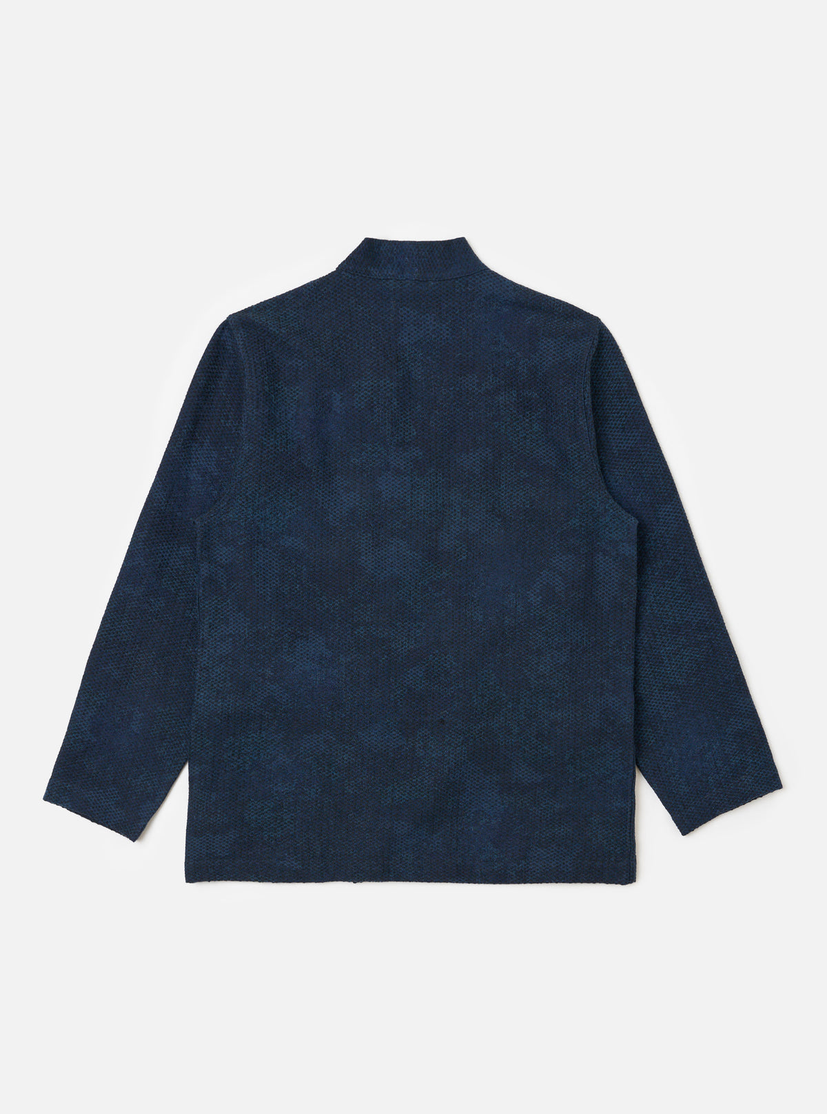 The Black/Indigo Denim Camo Kyoto Work Jacket on a white background. The jacket is denim with a camo pattern. The fit is relaxed and the material is durable.
