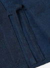 Close-up of the Black/Indigo Denim Camo Kyoto Work Jacket showing the fabric texture and pocket detail. The jacket is displayed on a flat surface.