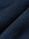 Close-up of the Black/Indigo Denim Camo Kyoto Work Jacket fabric. The material is a textured denim with a subtle camo pattern in black and indigo. 