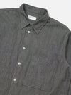 Close-up of the Charcoal Brushed Organic Cotton Square Pocket Shirt on a white background. The shirt is buttoned with a square pocket.