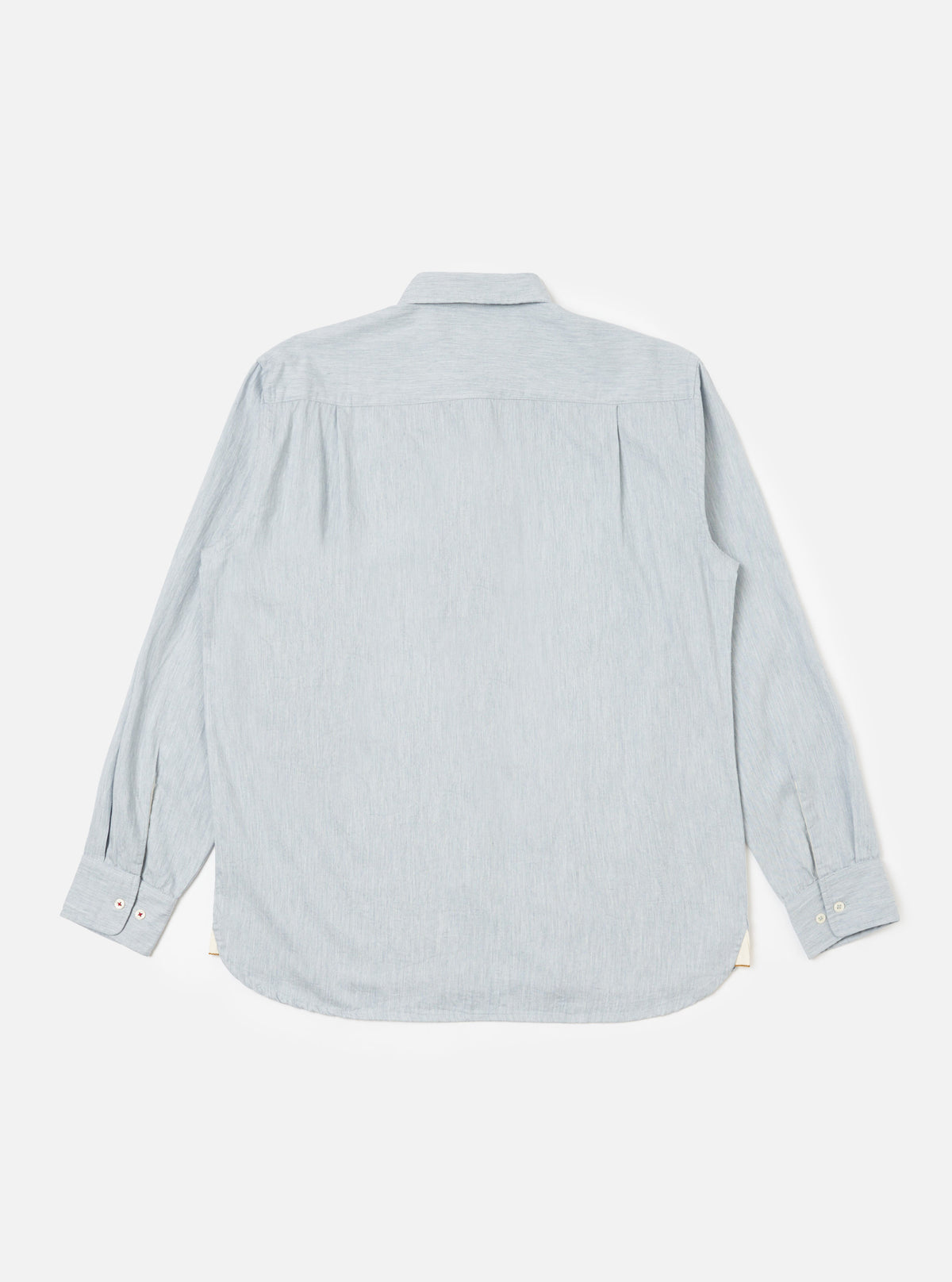 Back view of the Sky Blue Brushed Organic Cotton Square Pocket Shirt, laid flat on a white background. The shirt is a light blue color and made of brushed organic cotton.