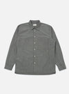 The Charcoal Organic Chambray Lucky Shirt, laid flat on a white background. The long-sleeved shirt is gray with white buttons and a chest pocket.
