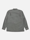 Back view of the Charcoal Organic Chambray Lucky Shirt on a white background. The shirt is long-sleeved and made of organic chambray material.