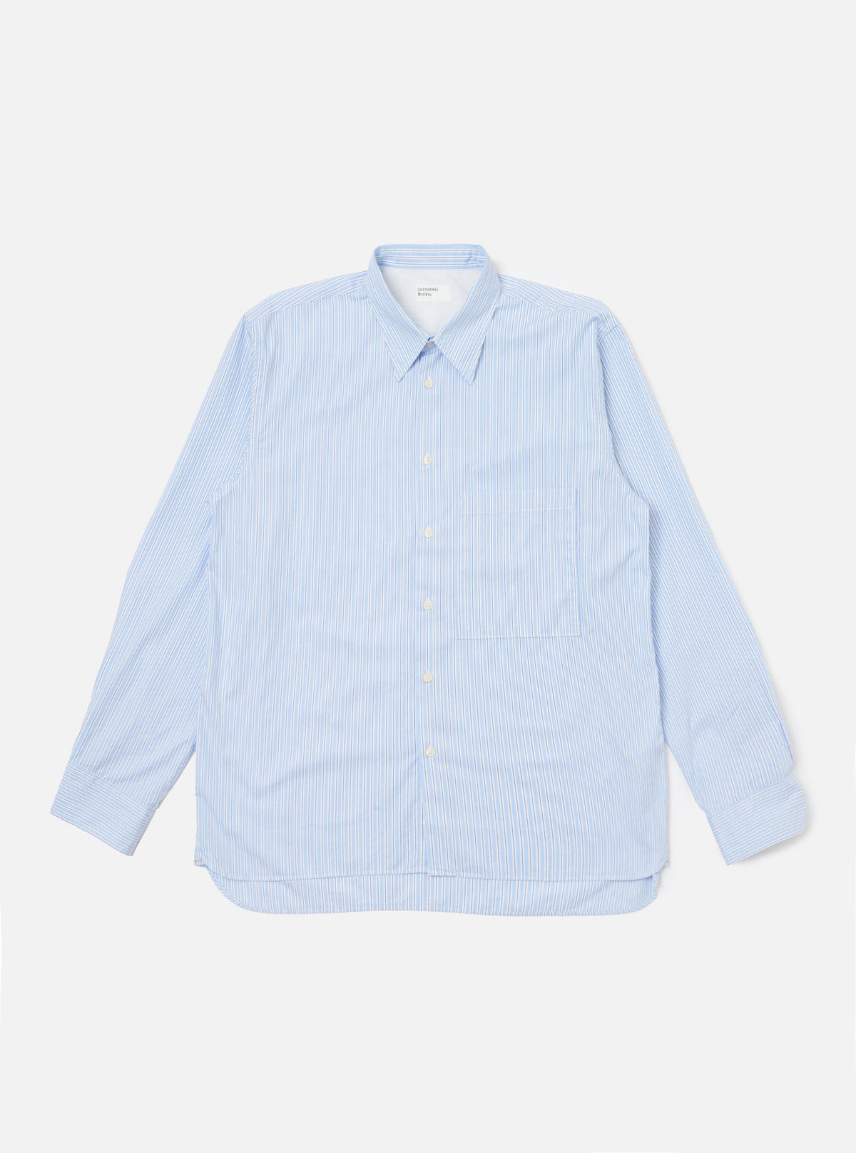 The Blue Office Stripe Square Pocket Shirt is laid flat on a white background. The shirt has blue and white vertical stripes and a square pocket on the chest.
