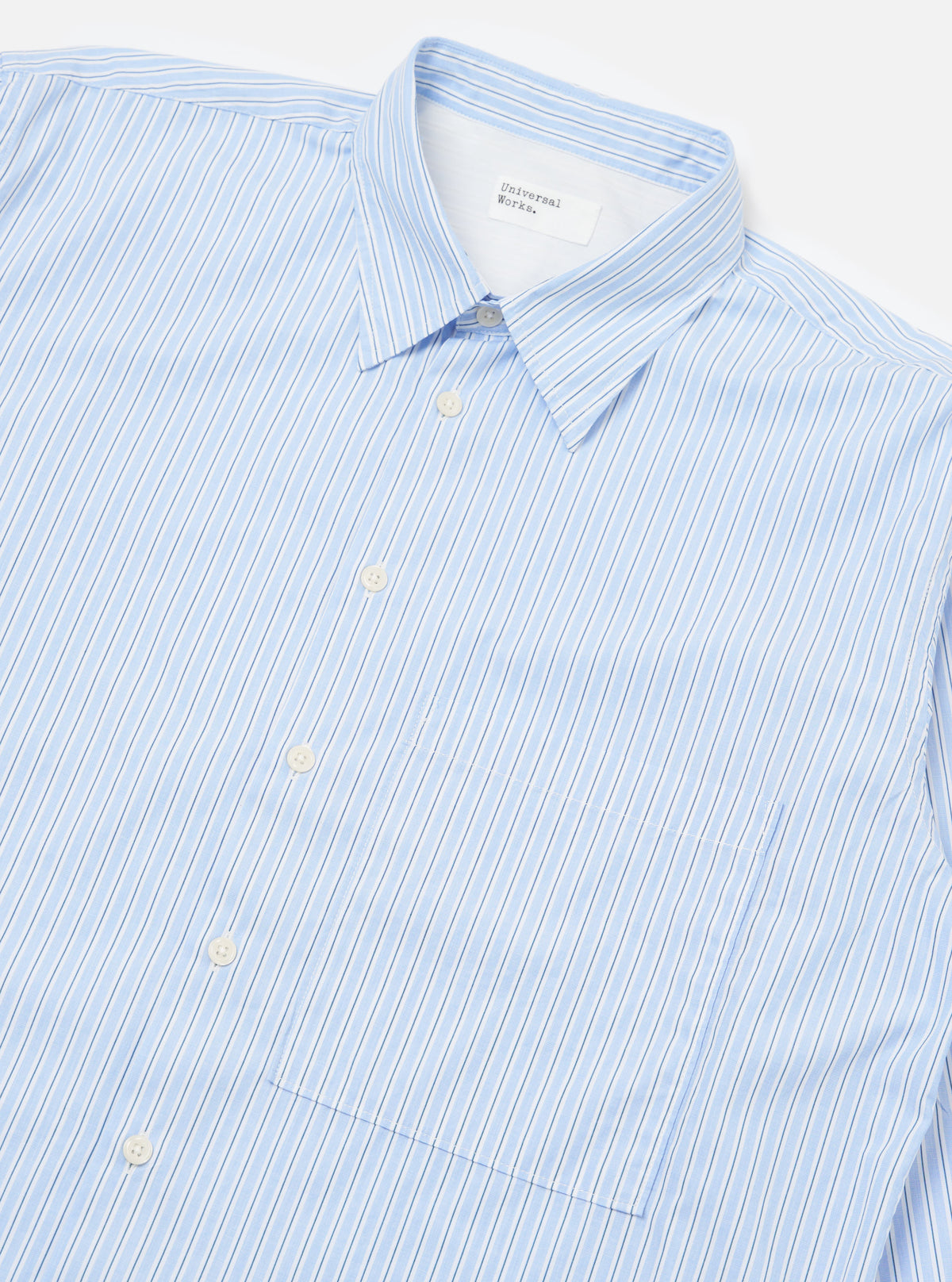 Close-up of the Blue Office Stripe Square Pocket Shirt on a white background. The shirt features a blue and white striped pattern and a square pocket.