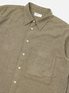 Close-up of the Mustard Brushed Marl Twill Square Pocket Shirt on a white background. The shirt is a textured twill with a square pocket and white buttons.