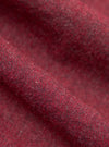 Close-up of the Red Brushed Marl Twill Square Pocket Shirt fabric. The red and grey twill weave is softly draped, showing the texture.