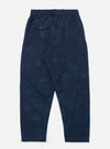 Back view of Black/Indigo Denim Camo Pleated Track Pant on a white background. The pants have a relaxed fit and feature a subtle camo pattern.