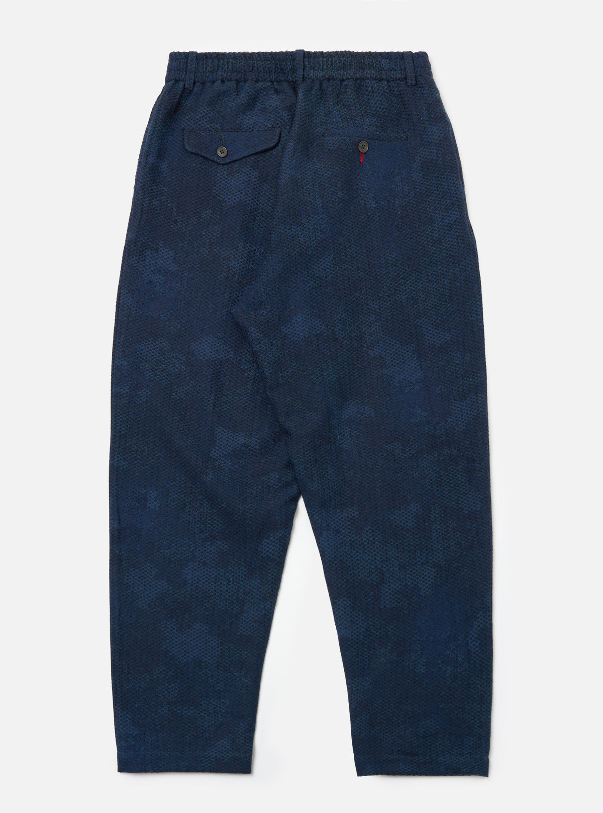 Back view of Black/Indigo Denim Camo Pleated Track Pant on a white background. The pants have a relaxed fit and feature a subtle camo pattern.