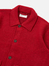 Close-up of the red wool fleece Rams Jacket on a white background. The jacket has a button-up closure and a classic collar.