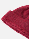 Close-up of a Red Alpaca/British Wool Bobble Hat on a white background. The knit is clearly visible.