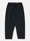 Back view of Black Cat Cord Pleated Track Pant on a white background. Shows the corduroy texture, pleated design, and relaxed fit. Features back pockets with button closures.