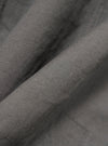 A close-up, square fabric swatch of the Mid Grey Linen Slub Weave Bakers Jacket highlights the textured, irregular slubbed surface of the linen and cotton blend. The mid-grey fabric features a visible woven pattern.