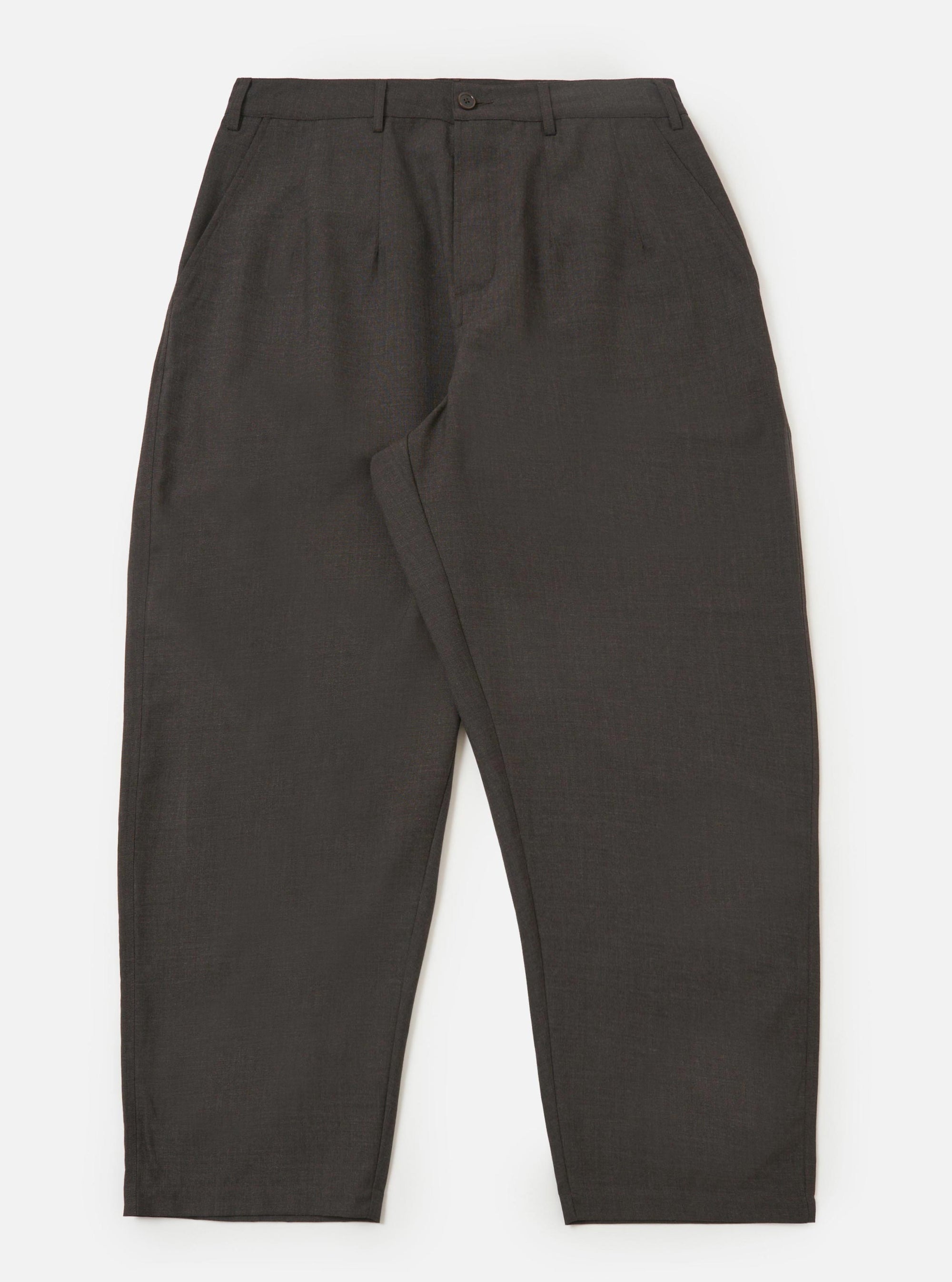 A pair of brown marl tropical suiting Dutch pants is displayed flat against a plain white background. The trousers feature a wide, loose-leg silhouette with visible stitched-down front darts and side buckle waist adjusters.