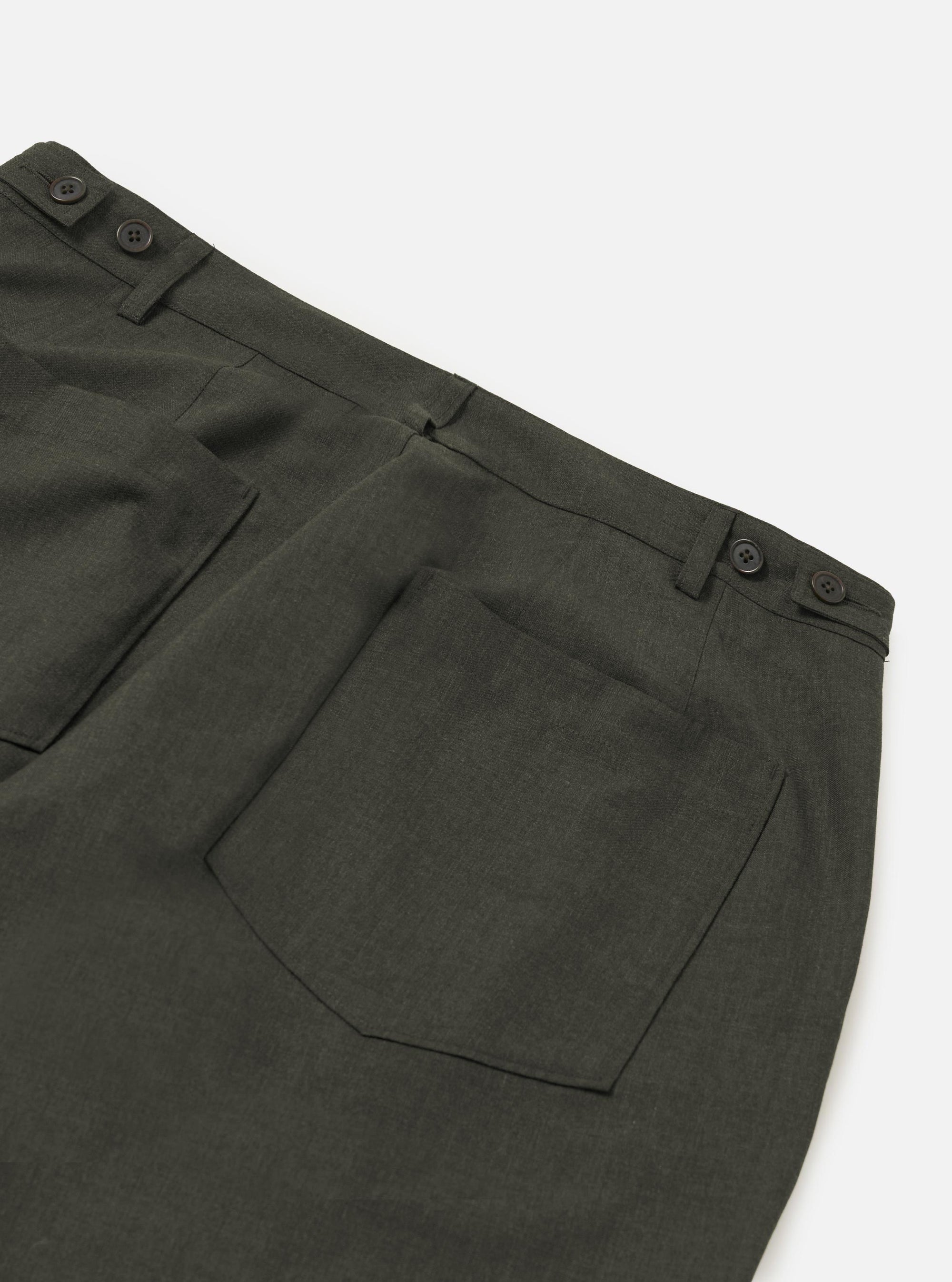 The Olive Marl Tropical Suiting Dutch Pant is shown from the back, laid flat against a solid white background. The image highlights the wide-leg cut, the elasticated waistband, and two large rear patch pockets.