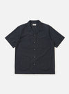 A navy check plaid summer overshirt is displayed flat against a plain white background. The garment features a classic collar, a full-length button placket, and long sleeves.