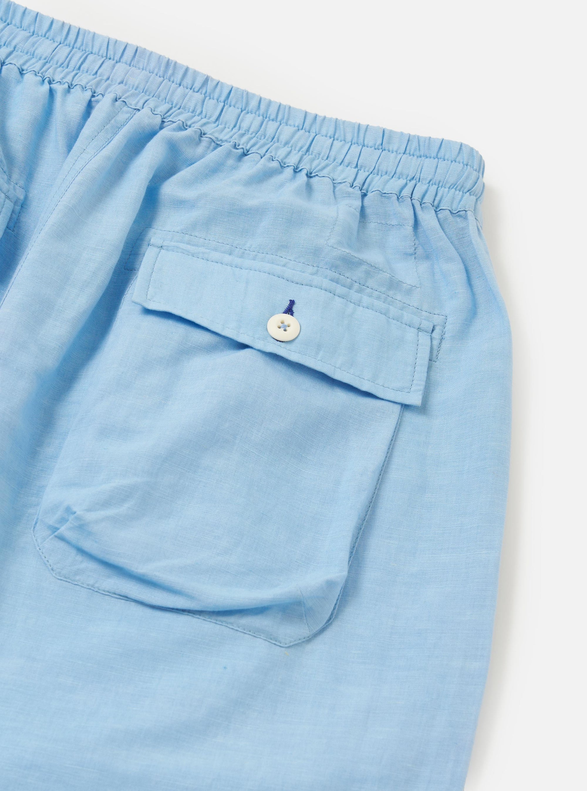 A close-up detail of the waistband of the Pale Blue Linen Cotton Shirting Parachute Pant is shown against a plain white background. The image highlights the elasticated waistband and the integrated drawstring.