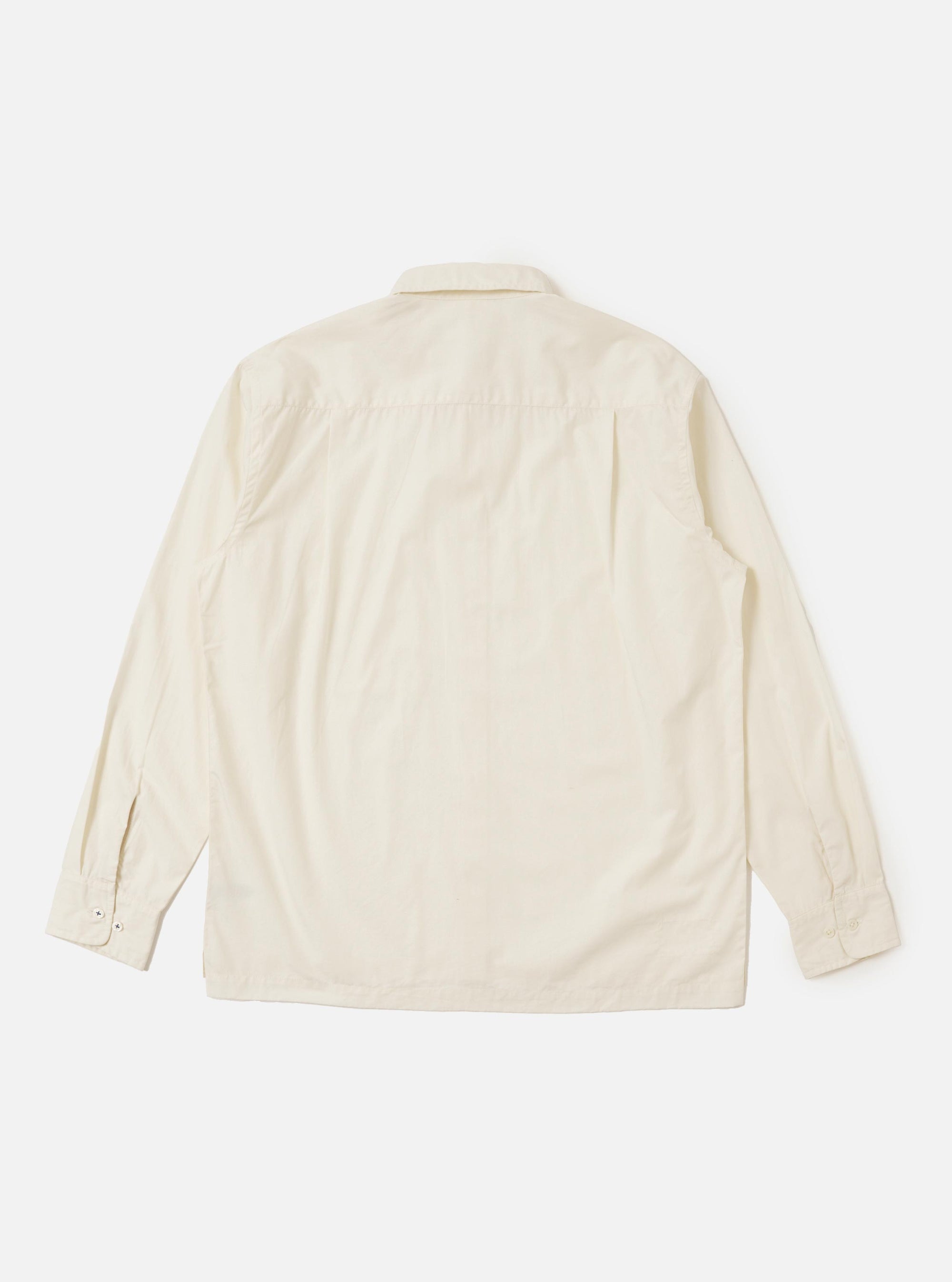 The Ecru Broadcloth Lucky Shirt is displayed flat against a plain white background. The shirt features a relaxed fit, a pointed collar, a full button-down front, and a single chest pocket.