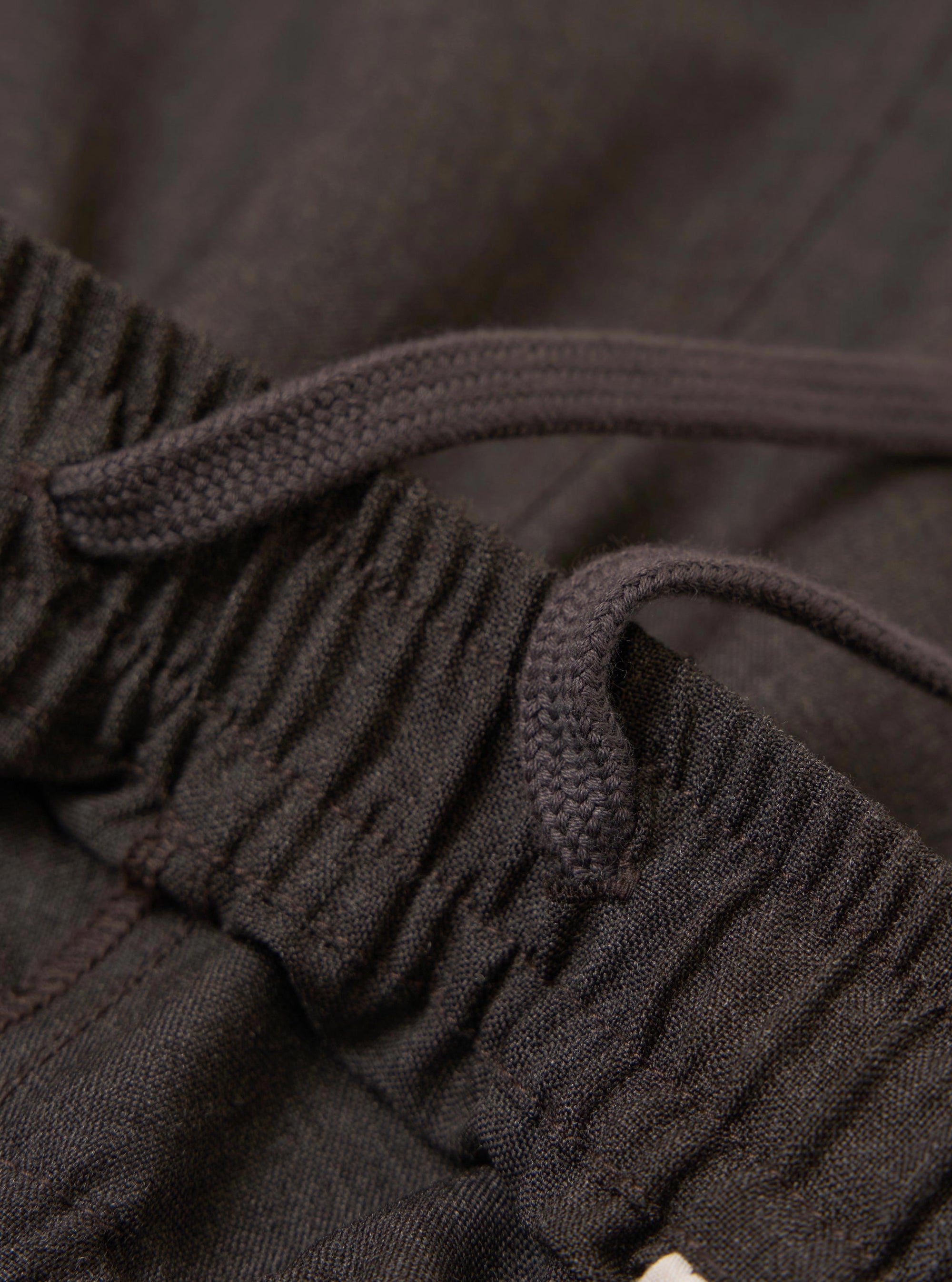 A pair of Brown Marl Tropical Suiting Vacation Shorts is displayed flat against a plain white background. The shorts feature a textured brown marl fabric, an elasticated waistband, and side pockets.