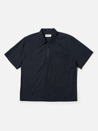 The Navy Broadcloth Ewan Shirt is shown laid flat against a solid white background. The navy blue pullover shirt features a classic pointed collar, a short quarter-zip at the neckline, and long sleeves.