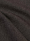 A detailed, close-up fabric swatch of the brown marl tropical suiting material used for the Ewan Shirt. The image highlights the fine weave and textured surface of the mottled brown fabric.