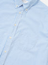A detail shot of the Sky/White Classic Nipon Stripe Lazy Day Shirt is displayed against a plain white background. The image focuses on the upper portion of the shirt, highlighting the vertical blue and white stripes, the button-down collar, and the top buttons of the placket.