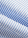 A detailed, close-up fabric swatch of the Sky/White Classic Nipon Stripe Ewan Shirt. The image highlights the vertical sky blue and white striped pattern and the textured weave of the cotton fabric.