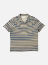 A Grey OS Stripe Jersey Vacation Polo is shown laid flat against a solid white background. The shirt features horizontal light grey and charcoal stripes with an irregular, hand-painted character. It has a relaxed open neck with a single-piece collar, a short front placket, a single patch chest pocket, and a straight hem.