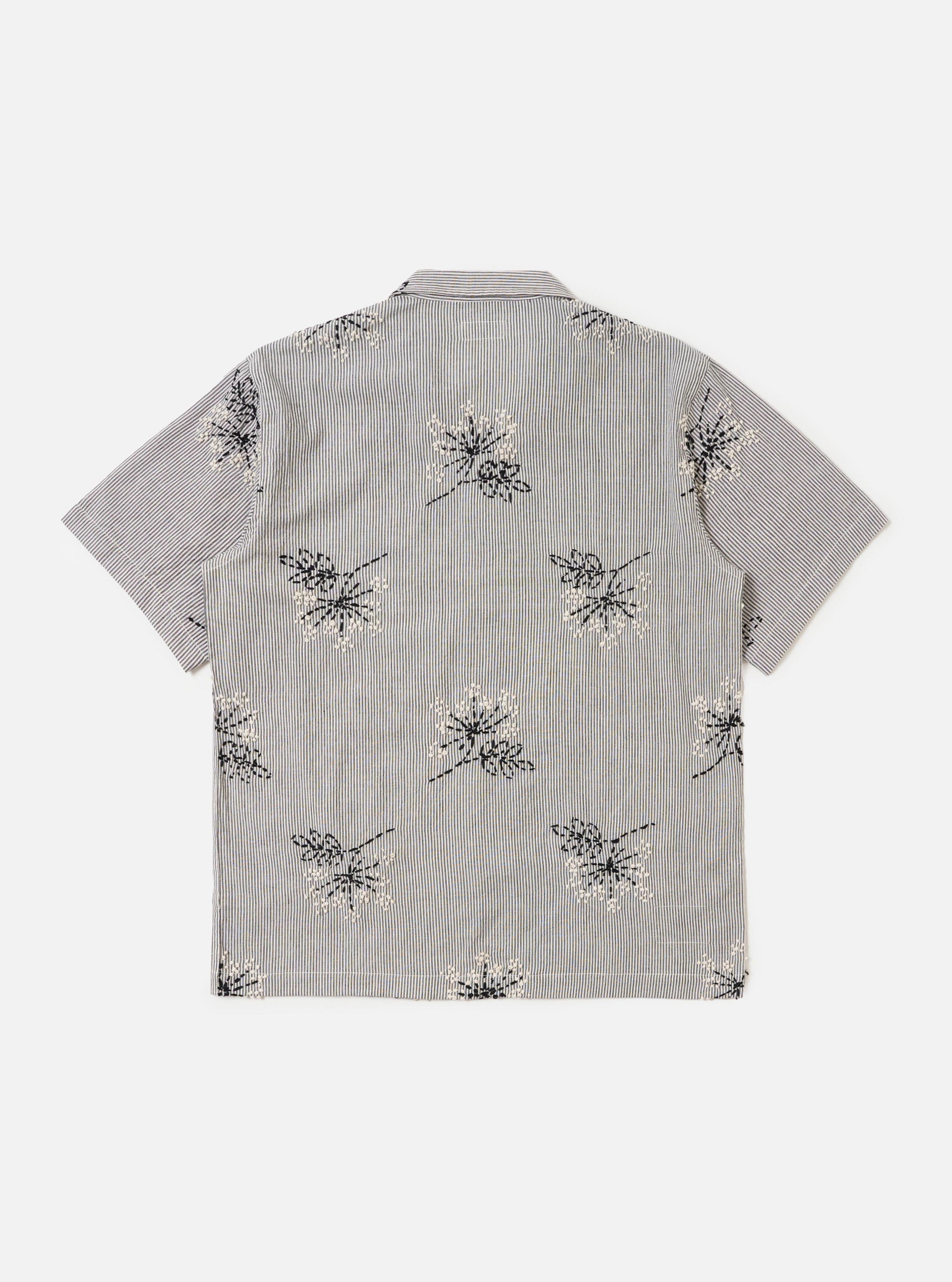 The Grey Hand Embroidered Stripe Cotton Road Shirt is shown from the back, displayed flat against a plain white background. The image highlights the short sleeves, a straight hem, and the subtle vertical stripe pattern of the grey cotton fabric.