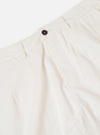 The Ecru Slub Drill Dutch Pant is shown from a rear angle, laid flat against a solid white background. The image highlights the wide-leg cut, the textured ecru cotton fabric, and two large rear patch pockets.