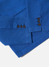 Close-up of the Paraboot x Universal Works Navy Derek Twill Warmus Jacket showing the navy twill material, button details, and tailored fit against a clean, white background.