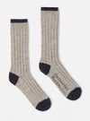 Two Stone Wool Hike Sock on a white background. The socks are ribbed and have a dark navy toe and top. The words "Universal Works" are printed on one sock.