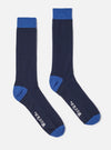 Studio shot of Navy Merino Classic Sock. The socks are navy with blue toe and top. Ribbed texture. White background.