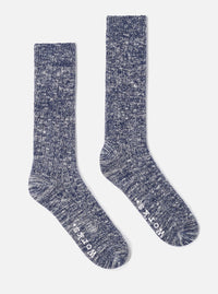 Two Navy Slub Knit Slub Socks are displayed on a white background. The socks have a ribbed texture and a heathered navy and white color. 