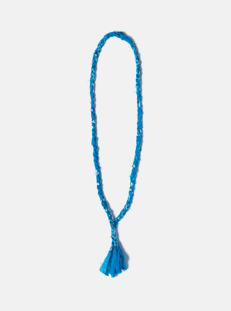 The Hanami of Rome Bandana Necklace/Bracelet #5 is blue and white. The necklace is on a white background.